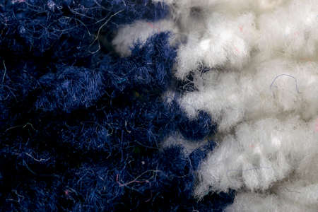 Blue and white wool textile pattern macro, clothing