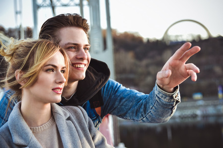 Young beautiful couple enjoying their time. Man and woman laugh and talk