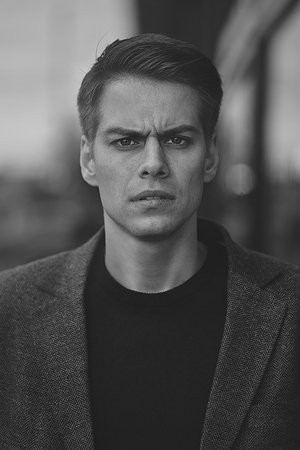 Portrait of a caucasian handsome man that is seriously frowning. Emotional face concept.の写真素材