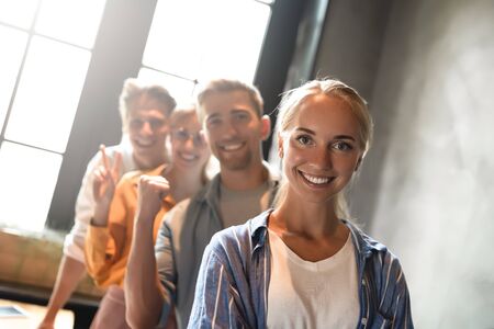 Close up photo of young business people stay together.の写真素材