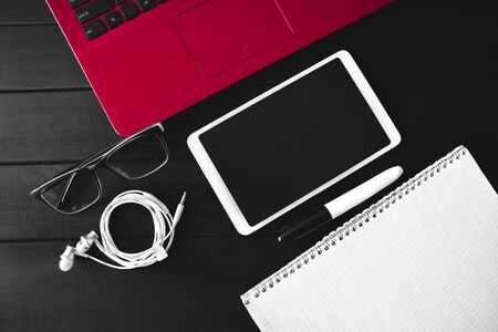 Home work concept, Tablet Pc, notepad and Laptop on wooden background, planning personal income....