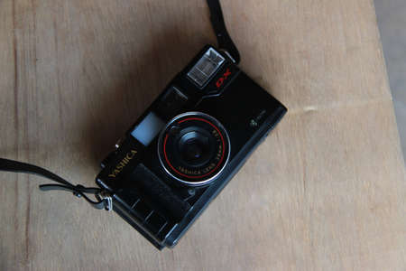 Yashica analog camera with a 38mm lens. pocket camera products that use film roll. Sidoarjo, Indonesia. June 2020のeditorial素材