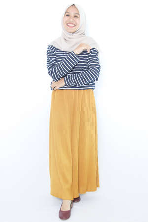 portrait of asian woman wearing blue striped shirt and color skirt. woman in casual dress on white background isolated. profile photo for clothing store designの写真素材