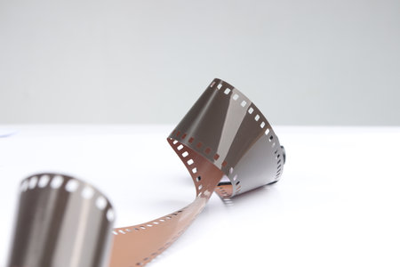 camera roll film with isolated white background. products for analog cameras. the concept of an old model photographic tool that is suitable for design and other materialsの写真素材