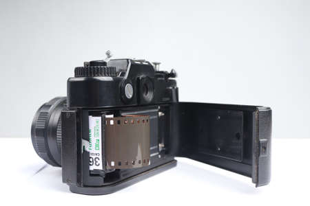 Surabaya, Indonesia. December 2021. Vintage analog camera with isolated white background. old technology products for photographyのeditorial素材