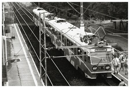 train track at the railway station black and white; from aboveの写真素材