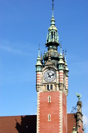 clock tower in a historic brick building in GdaÅ„sk Poland train station