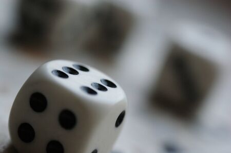 dice game many pieces closeup  four and six black and white