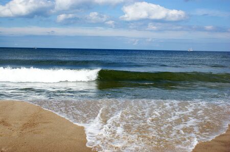 Polish Baltic Sea beautiful blue sea waves ocean horizon sand and beach blue sky