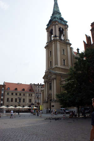 the city square in the city of ToruÅ in Poland brick townhousesの写真素材
