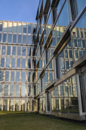 glass office building blue architecture office district mirrored reflection
