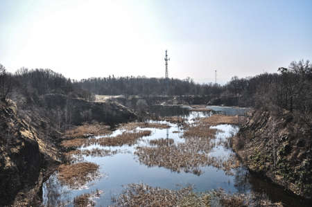 old abandoned stone quarry basalt mine flooded with water Strzegom in Poland