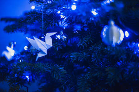 blue Christmas lights white origami baubles original and unusualの写真素材