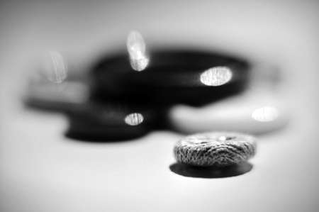 close-up of a group of buttons for sewing clothes black and whiteの写真素材