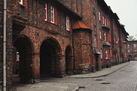 Old red brick buildings in the old town of Katowice Nikiszowiec red detailsの写真素材
