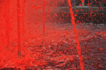 Fountain with red colored water in Katowice cityの写真素材