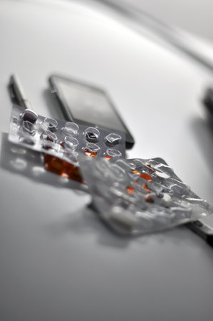 Tablets in blister packs, partially emptied, lyingの写真素材