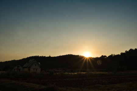 Sunset behind the Bieszczady Mountains the light of the setting sun Polandの写真素材