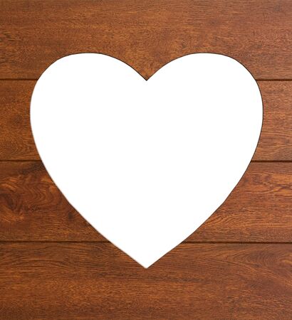 heart in wood on white backgroundの写真素材