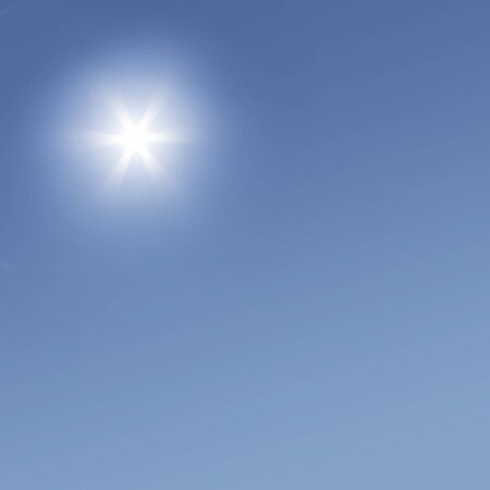 hot shining sun on the clear blue skyの写真素材