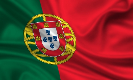 waving flag of portugalの写真素材