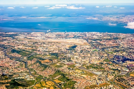 View over Lisbon, Portugal with airport, ponte vasco da gama, river tejo の写真素材