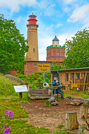 Putgarten, Germany - June 22, 2012: Lighthouse at Kap Arkona with captain sculture. A famous tourist destination on the island of rugia.のeditorial素材