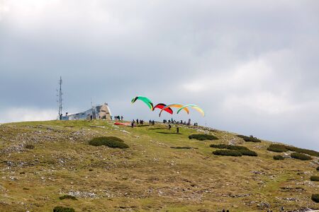 Obertraun, Austria - June 27, 2014: View of the World Heritage Spiral ("Welterbespirale") at Dachstein-Krippenstein with starting paragliders.のeditorial素材