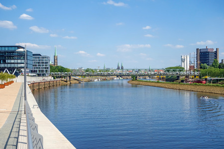 Bremen, Germany - June 6, 2014: Cityscape with Wesertower on the left, Becks brewery on the right, Weser river with Stephaniebruecke bridge in the foreground:のeditorial素材