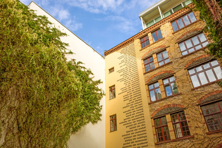 Berlin, Germany - October 26, 2013: Facade of one of the eight yards called "Hackesche Hoefe" in the district Spandauer Vorstadt. They was refurbished in 1993 and host today several shopping malls, galleries and restaurants.のeditorial素材