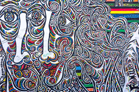 Berlin, Germany - October 26, 2013: East Side Gallery - an international memorial for freedom. Former Berlin Wall - a barrier within Germany, dividing the country.のeditorial素材