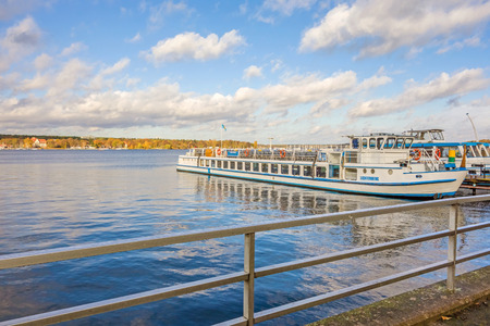 Berlin, Germany - October 27, 2013: View over the Lake Wannsee - the biggest in the hinterland of Berlin. Shipping pier with passenger ship on the right.のeditorial素材