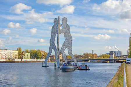 Berlin, Germany - October 29, 2013: Molecule Man sculpture by Jonathan Borofsky. The sculpture represent the intersection of the districts Treptow, Kreuzberg and Friedrichshain.のeditorial素材