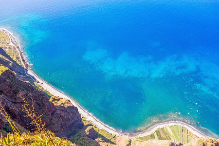 Cabo Girao on the Island Madeira - a sight with spectacular view from a glass platform to the atlantic ocean and terraced fieldsの写真素材