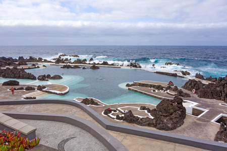 Porto Moniz, Portugal - June 2, 2013: Natural rock pool of Porto Moniz. It is a public bath with water from the Atlantic Ocean.のeditorial素材