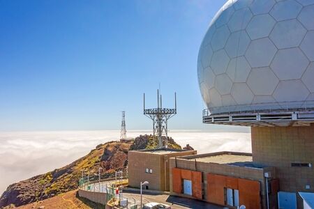 Ribeiro Frio, Portugal - June 6, 2013: Technical infrastructure at Pico Arieiro, Madeiras third highest mountain. View over the clouds.のeditorial素材