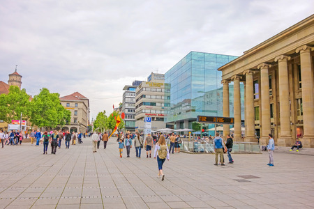 Stuttgart, Germany - May 24, 2013: Famous shopping promenade Koenigstrasse, between Koenigsbau and Schlossplatz square. On the right, the new art museum, a modern building with glass facade.のeditorial素材