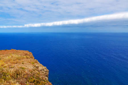 Madeiras westermost point - Ponta do Pargo - view of the deep blue Atlantic Ocean, unique cloud formationの写真素材