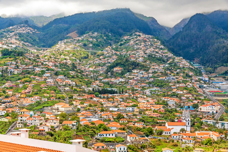 Funchal, Madeira - June 7, 2013: View over Funchal, the capital city of Madeira from Pico dos Barcelo.のeditorial素材