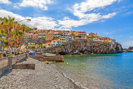 Camara de Lobos, Madeira - June 8, 2013: Town Camara de Lobos, Madeira with fishing boats. The picturesque fishermens village is famous for its former guest Winston Churchill.のeditorial素材