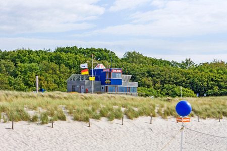 Graal-Mueritz, Germany - June 14, 2012: Modern lifeguard station of DLRG (Deutsche Lebens-Rettungs-Gesellschaft) at beach in Graal-Mueritzのeditorial素材