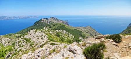 Bay of Pollenca, peninsula Formentor, view from peninsula Victoria - coastal cliff coast with ocean view panoramaの写真素材