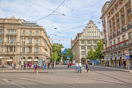 Zurich, Switzerland - June 10, 2017: Square Paradeplatz , inner city of Zurich, view towards shopping promenade called Bahnhofstrasse.のeditorial素材