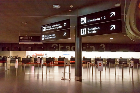 Zurich airport, Check-in desk 3, sign to departure gates, tram, toiletsのeditorial素材