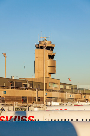 Zurich, Switzerland - June 11, 2017: Airport Zurich (Flughafen Zurich) - view of Tower and airfield with several airbus of airline "swiss" in parking positionのeditorial素材