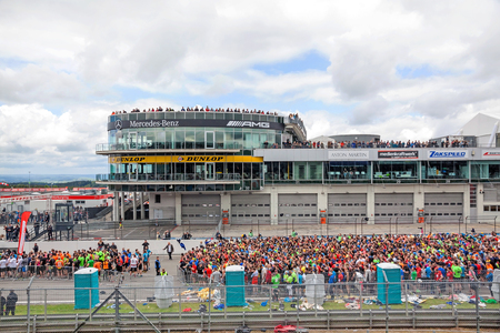 Nurburg, Germany - May 20, 2017: Fishermen's Friend Strongman RUN at race track Nurburgring - runners waiting for start on start finishing straight in front of Mercedes / AMG lounge towerのeditorial素材