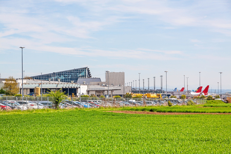 Airport Stuttgart, Terminal, exterior view with green field in foregroundのeditorial素材