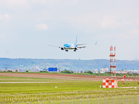 Stuttgart, Germany - April 29, 2017: Airbus airplane A320 from TUIfly on landing approach to airport Stuttgart - green meadow with weather station in frontのeditorial素材