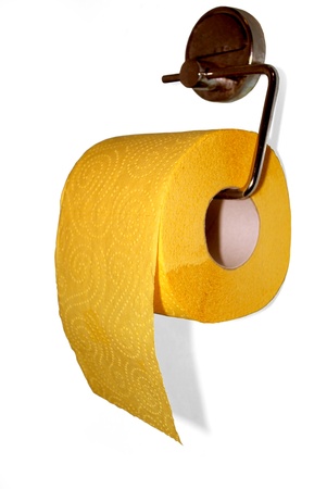 Rolled Yellow Toilet Paper Hanging on Fixture Isolated on Whiteの写真素材