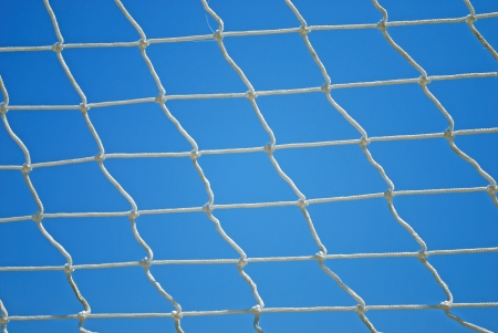 Valleyball Net Strings over Blue Sky Backgroundの写真素材